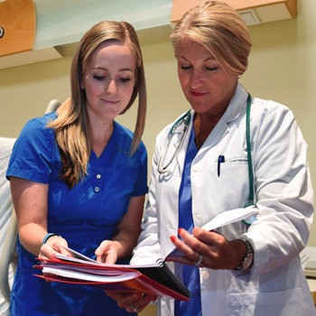 two nurses talking